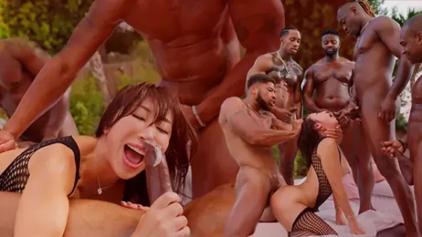 Woman Squirts in Interracial Gangbang